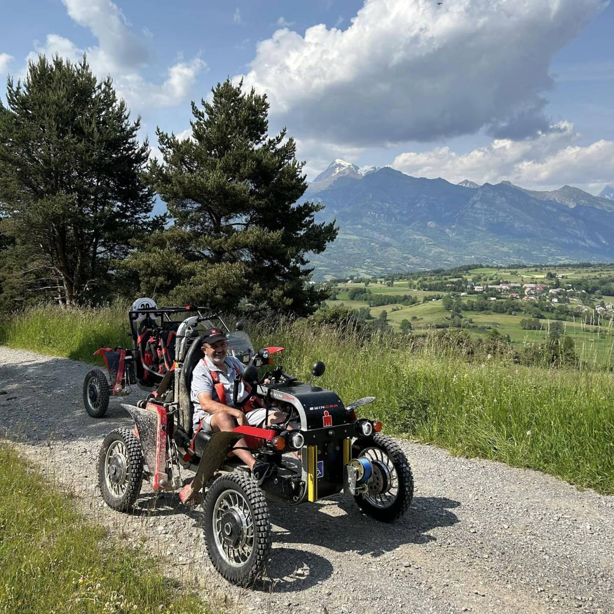 Individual with disabilities doing a road trip thanks to Swincar, electric four wheel drive